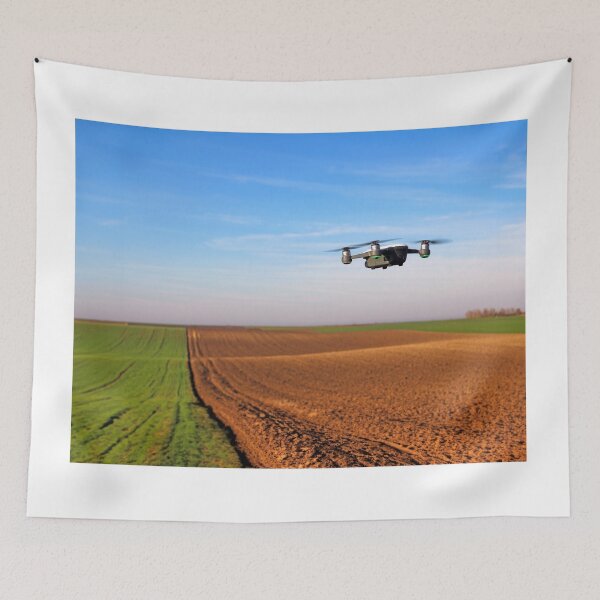 Item preview, The drone quad copter is flying over the plowed field agriculture industry designed and sold by goceris.