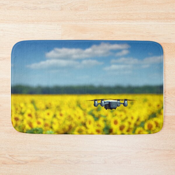 Item preview, The drone is flying over the sunflower field summertime designed and sold by goceris.