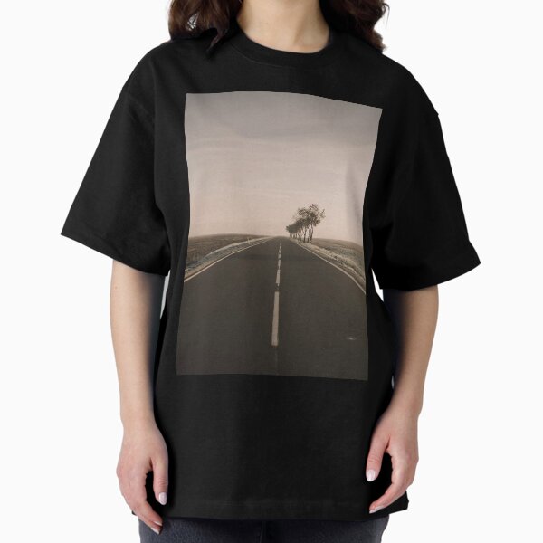 Empty road with no cars with trees in the roadside Oversized T-Shirt
