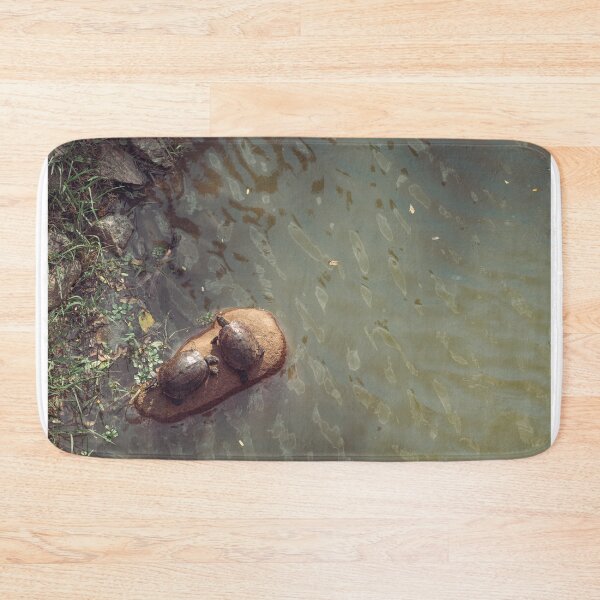 Item preview, Tortoise laying on the rock  at the lake designed and sold by dankomarcha.