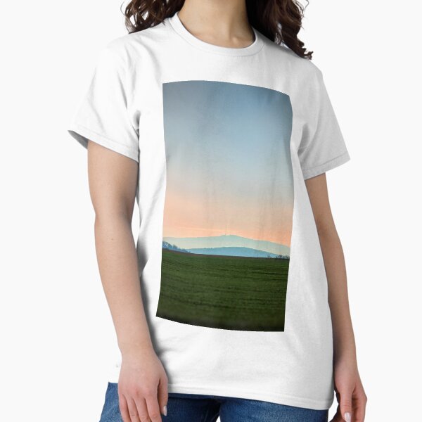 view of the mountain against the backdrop of the setting sun Classic T-Shirt