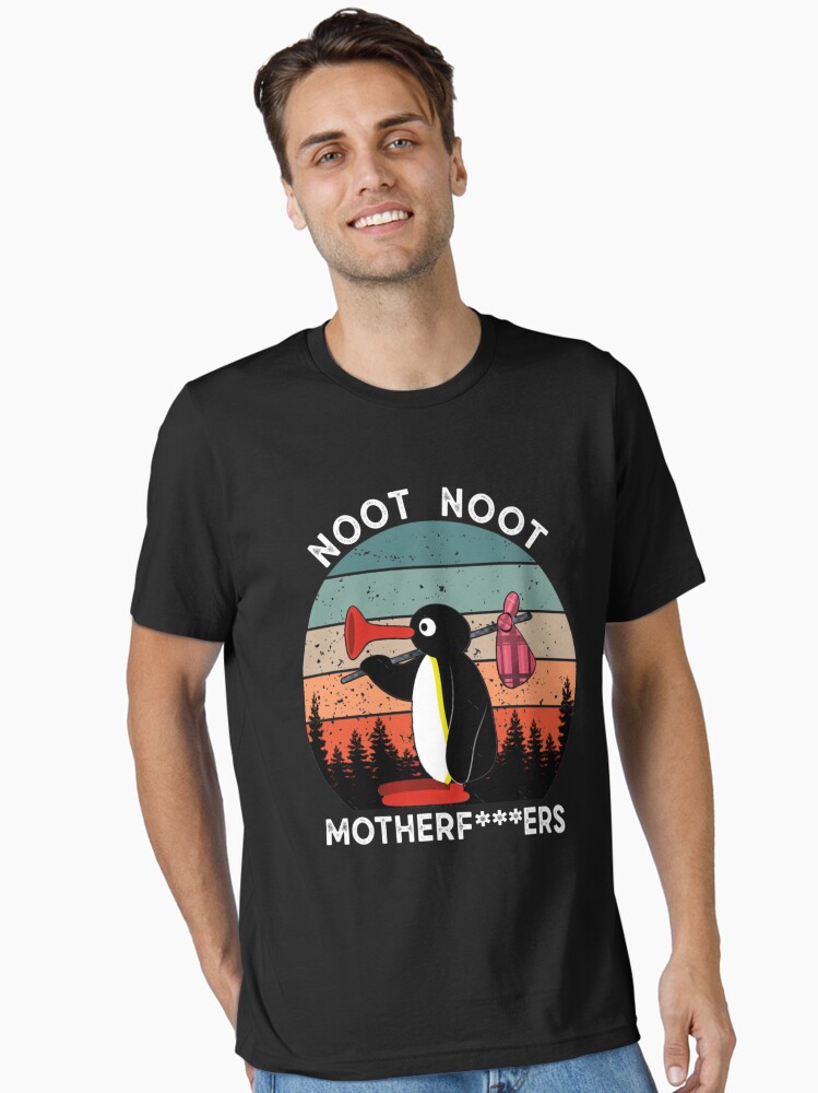 Imagen 1 de 7, Camiseta esencial con la obra Noot Noot Pingu Retro, diseñada y vendida por EvieZemlakghj.