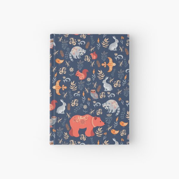 Fairy-tale forest. Fox, bear, raccoon, owls, rabbits, flowers and herbs on a blue background. Hardcover Journal