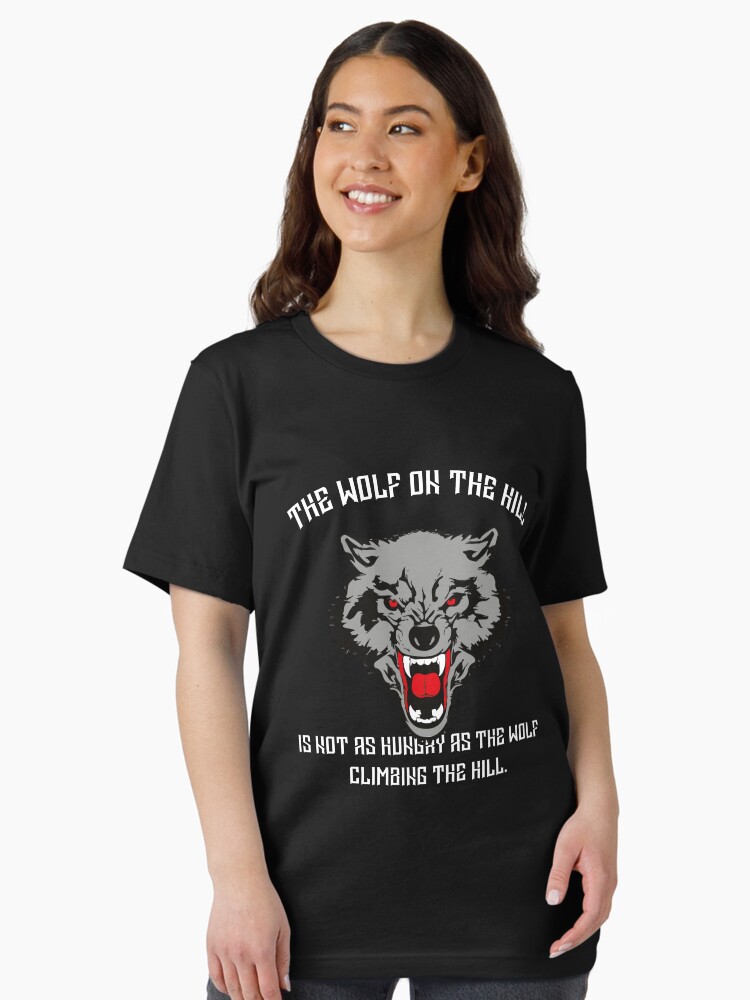 The wolf on hill is not as hungry as the wolf climbing the Essential  T-Shirt