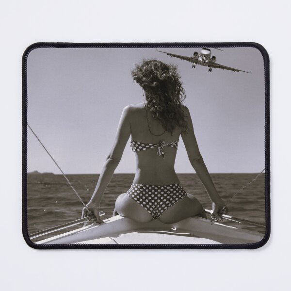 Item preview, Swing by; airplane turning to fly over girl on a boat black and white photographic art print  designed and sold by Jéanpaul  Ferro.
