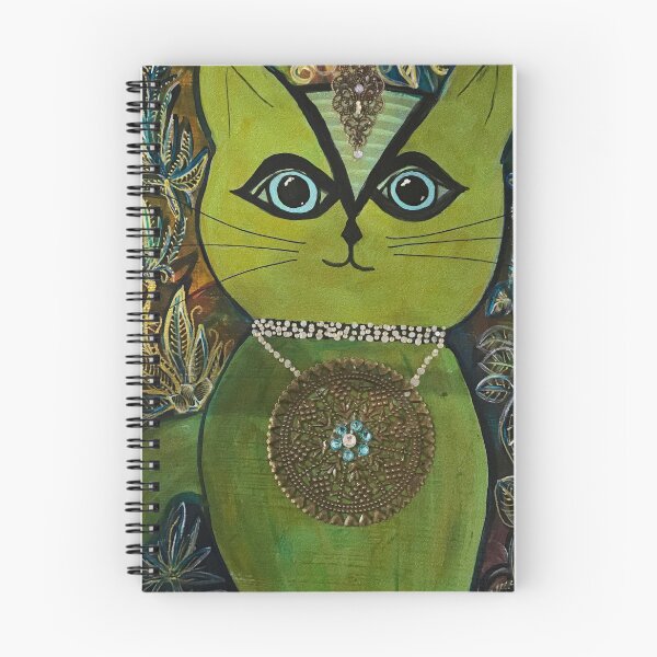 Item preview, Cosmic Cat- Miss Maxi. She's green with blue eyes and a large brass mandala pendant, designed and sold by Mary Egan.