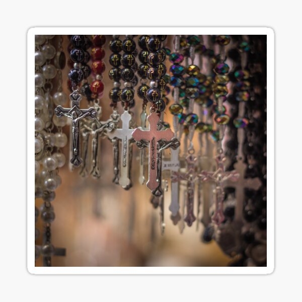 Rosaries hanging in Israeli Market Sticker