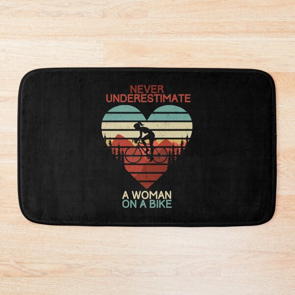 Item preview, Never Underestimate a Woman on a Bike designed and sold by aiveohgraphics.