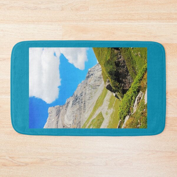 Item preview, Picturesque Swiss Alpine landscape with green grass slopes against the backdrop of high mountains designed and sold by IaroslavB.