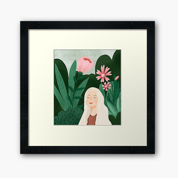Girl in green garden Framed Art Print