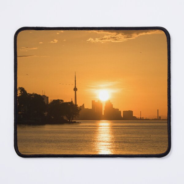 Item preview, Silhouettes and Bird Flocks - Brilliant Sunup Behind Toronto Skyscrapers designed and sold by Georgia Mizuleva.