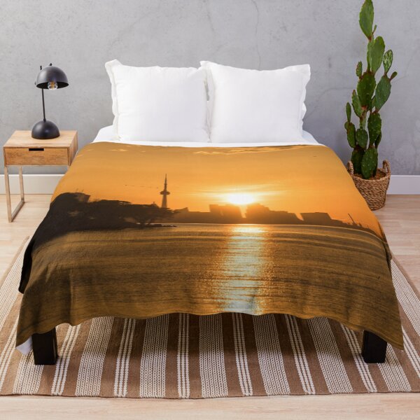 Item preview, Silhouettes and Bird Flocks - Brilliant Sunup Behind Toronto Skyscrapers designed and sold by Georgia Mizuleva.