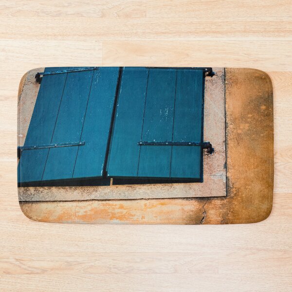 Item preview, Greek Blue Window Shutter on Ochre Color Building nickbrayimages designed and sold by nickbrayimages.