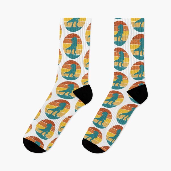 Item preview, Vintage T-REX dinosaur against a sunset backdrop designed and sold by PrzemekJAS.