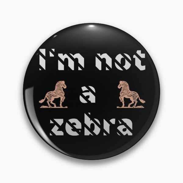 Item preview, I'm not a zebra. White letters with a mask in the shape of diagonal stripes and two red zebras designed and sold by SplashTastic.