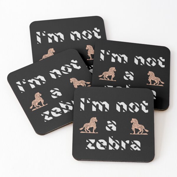 Item preview, I'm not a zebra. White letters with a mask in the shape of diagonal stripes and two red zebras designed and sold by SplashTastic.