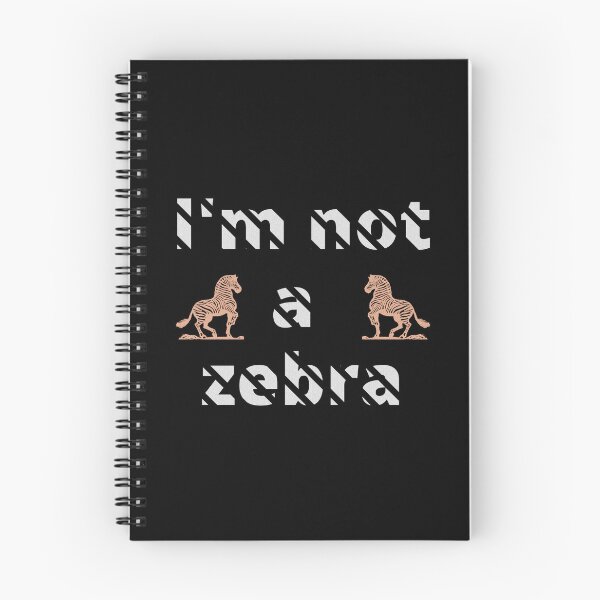 Item preview, I'm not a zebra. White letters with a mask in the shape of diagonal stripes and two red zebras designed and sold by SplashTastic.