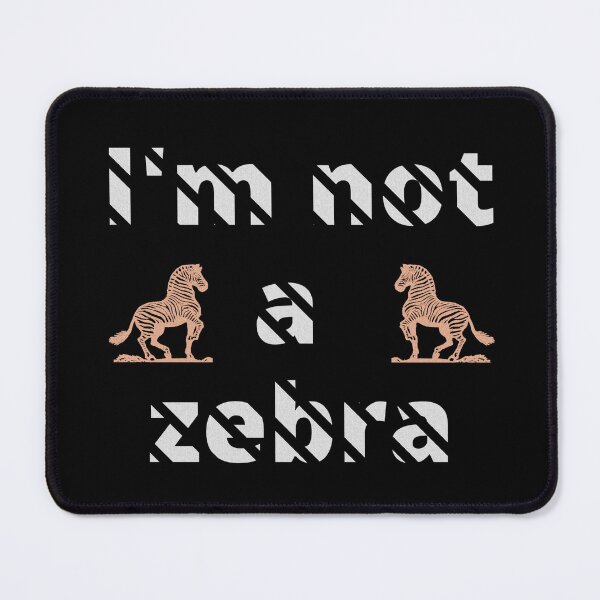 Item preview, I'm not a zebra. White letters with a mask in the shape of diagonal stripes and two red zebras designed and sold by SplashTastic.
