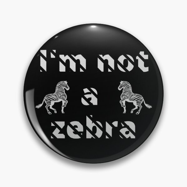 Item preview, I'm not a zebra. White letters with a mask in the shape of diagonal stripes and two black and white zebras designed and sold by SplashTastic.