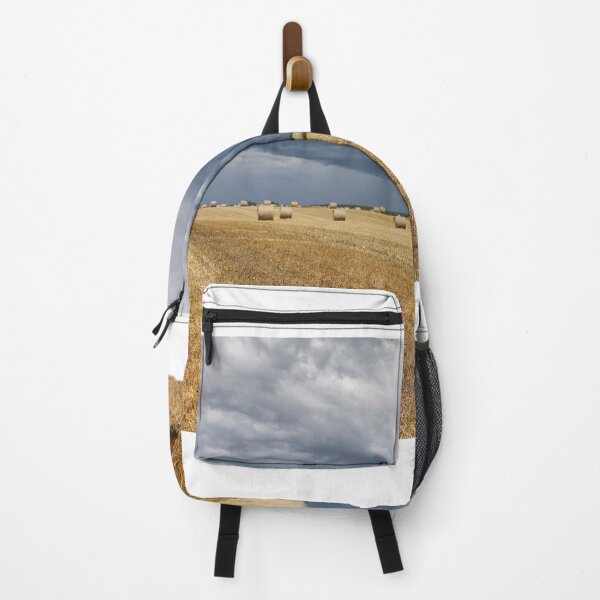 Item preview, stormy sky over field with straw bale designed and sold by goceris.