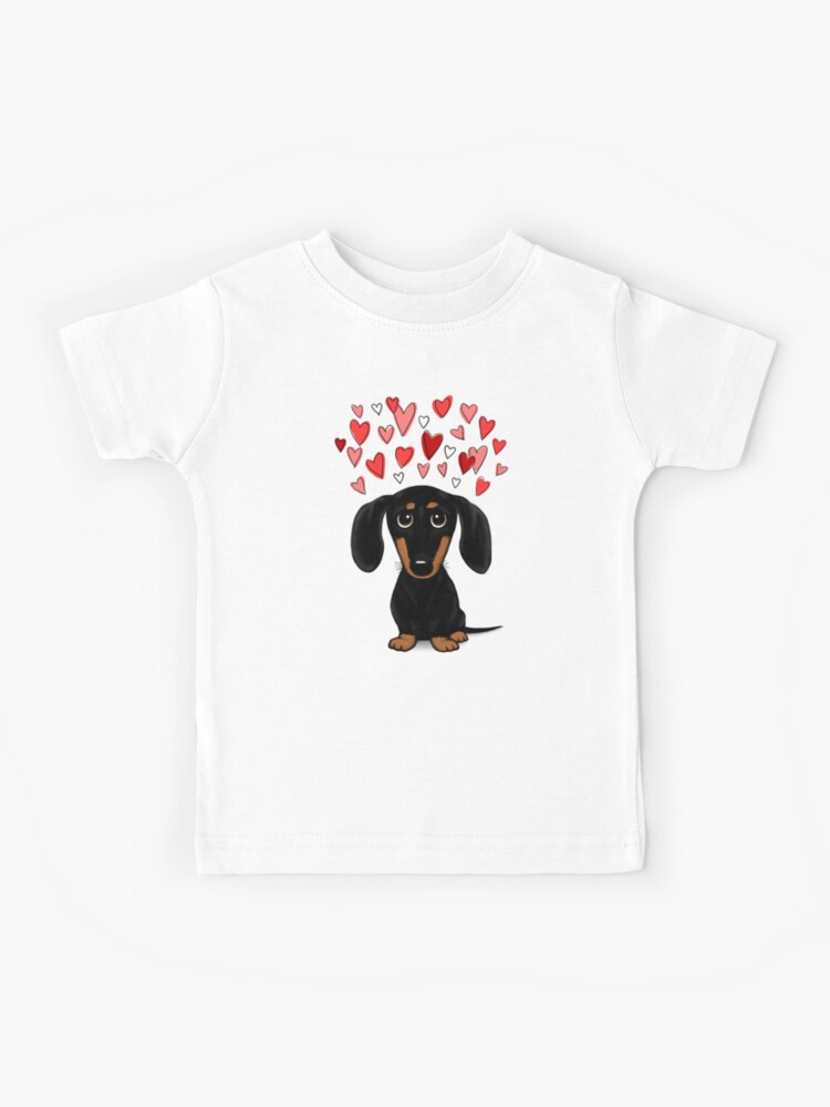 Thumbnail 1 of 2, Kids T-Shirt, Black and Tan Dachshund with Valentine Hearts | Cute Cartoon Wiener Dog designed and sold by Jenn Inashvili.