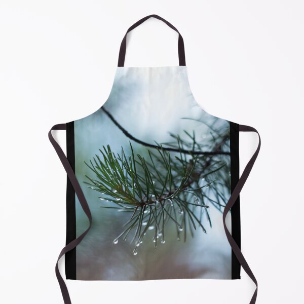 Item preview, Pine branch with water drops on a blurred background of pine needles designed and sold by LiubovAvdeeva.