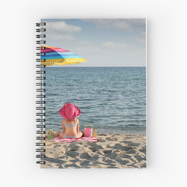 Item preview, little girl with hat sitting under sunshade on beach designed and sold by goceris.
