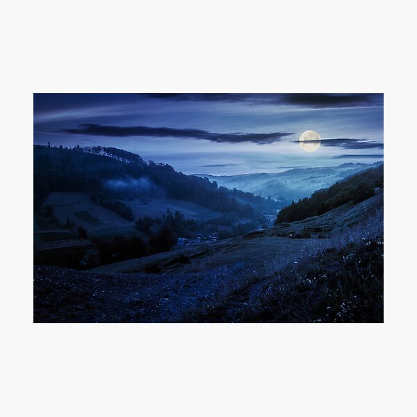 rural valley with forested hills at night Photographic Print