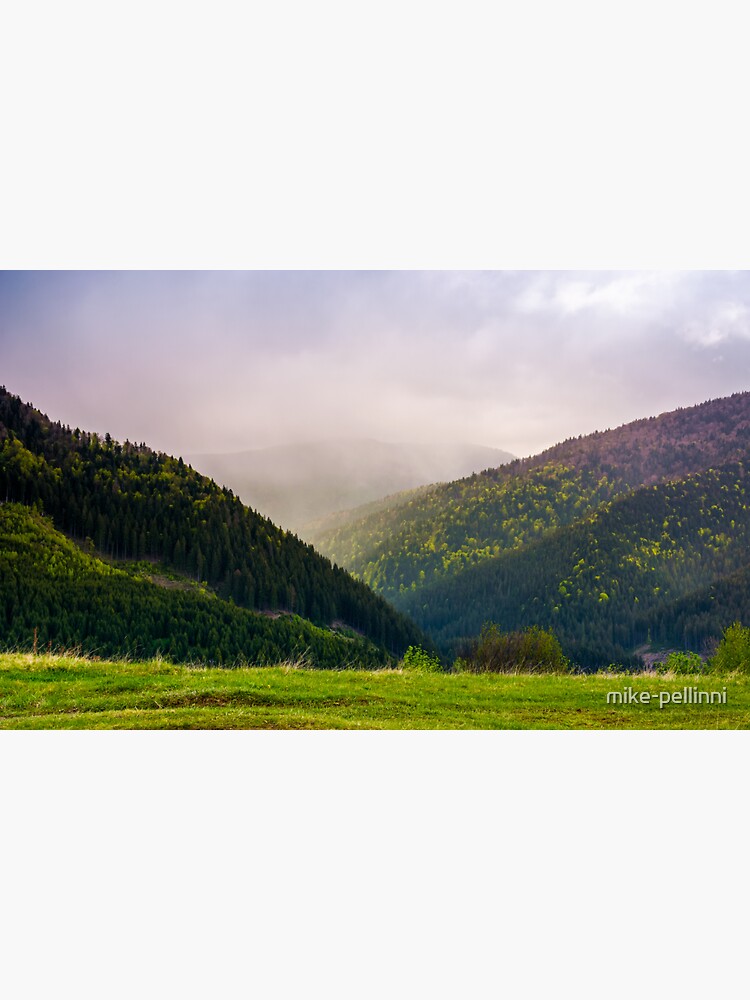mountains on a cloudy springtime day by mike-pellinni