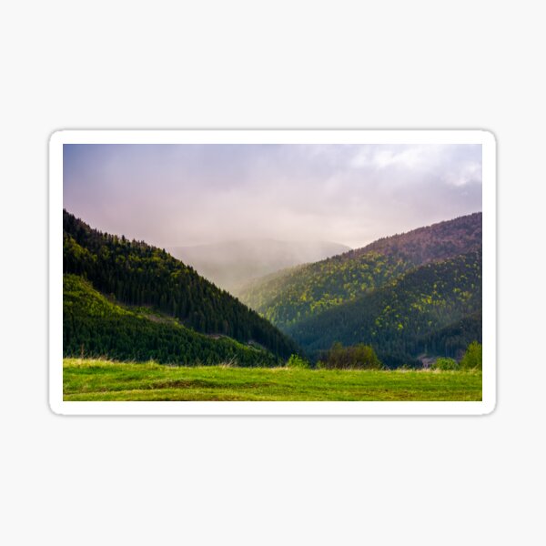 mountains on a cloudy springtime day Sticker