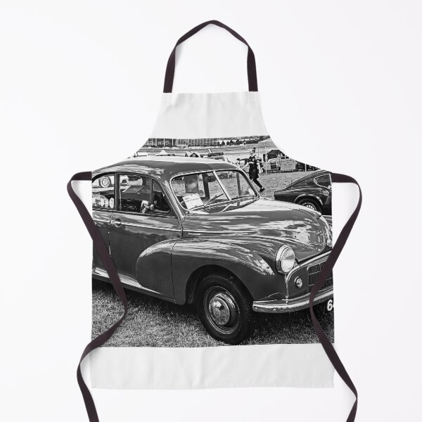 Item preview, Black and white image of the front of a green Morris Minor, 1953 designed and sold by Graham Cornall.