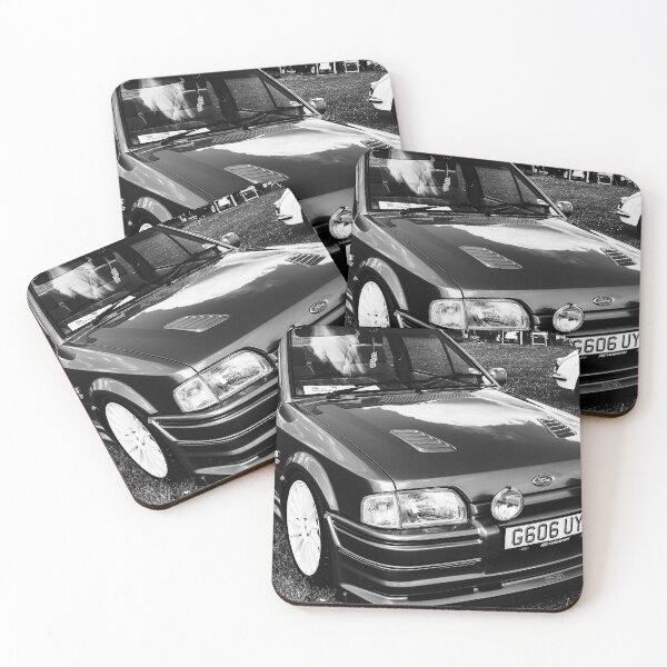 Item preview, Black and white image of the front of a blue Ford Escort convertible, 1990 designed and sold by Graham Cornall.
