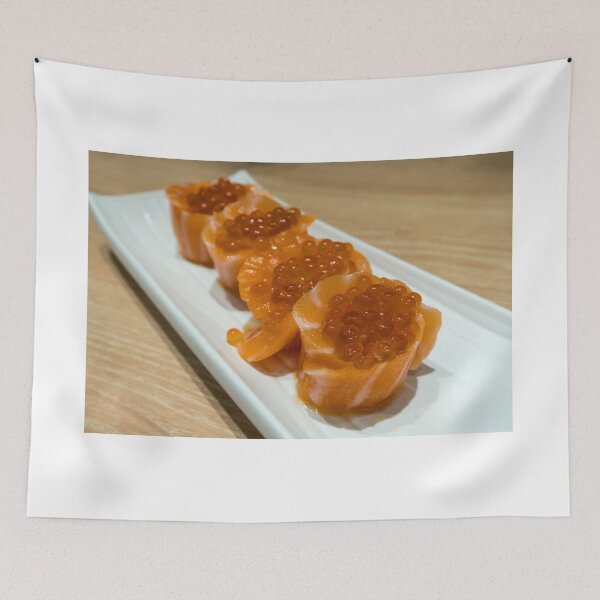 Item preview, Fresh Raw Salmon Sushi roll with fish egg roe on long white plate closeup macro designed and sold by jpldesigns.