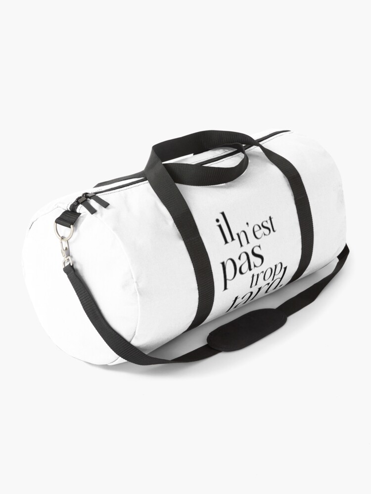 Aperçu 1 sur 3. Sac de sport avec l'œuvre il n'est pas trop tard créée et vendue par enFRANCAISsvp.