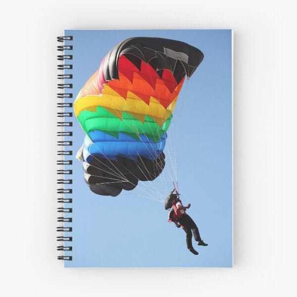 Item preview, parachutist with colorful parachute on blue sky designed and sold by goceris.