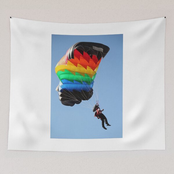 Item preview, parachutist with colorful parachute on blue sky designed and sold by goceris.