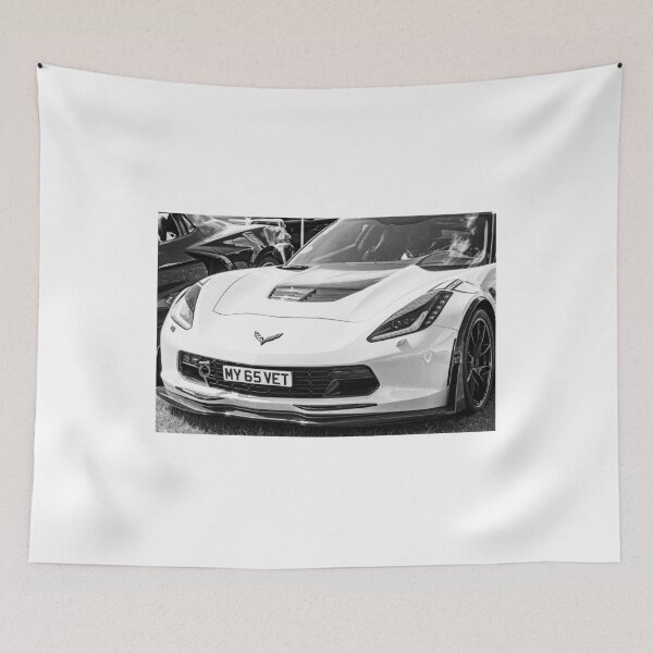 Item preview, Black and white image of the front of a white Chevrolet Corvette on display designed and sold by Graham Cornall.