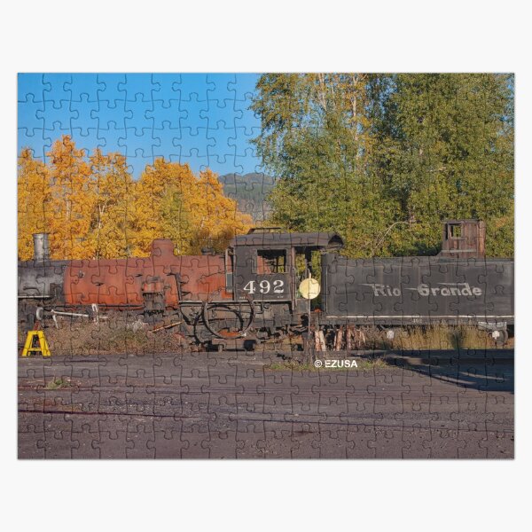 Item preview, The Perfect Gift For Someone Who Puzzles You: The 1,000 Piece Challenge ~ Comes In A Metal Gift/Storage Box. Also, It's “TIME” To Check Out The Matching 10.25” Wall Clock. designed and sold by MoreEZUSA-Here.