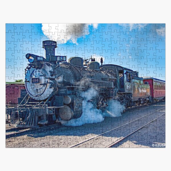 Item preview, Gift Yourself A Steam Train Ride With The 1,000 Piece Jigsaw Puzzle Challenge ~ Comes In A Metal Gift/Storage Box. Also, It's “TIME” To Check Out The Matching 10.25” Wall Clock. designed and sold by MoreEZUSA-Here.