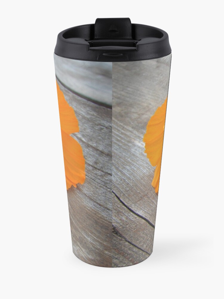 Alternate view of Orange flowers on a wooden table Travel Mug