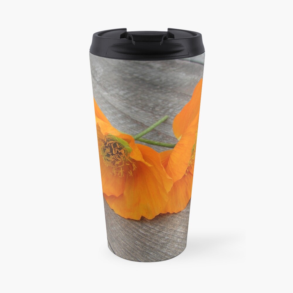 Orange flowers on a wooden table Travel Mug