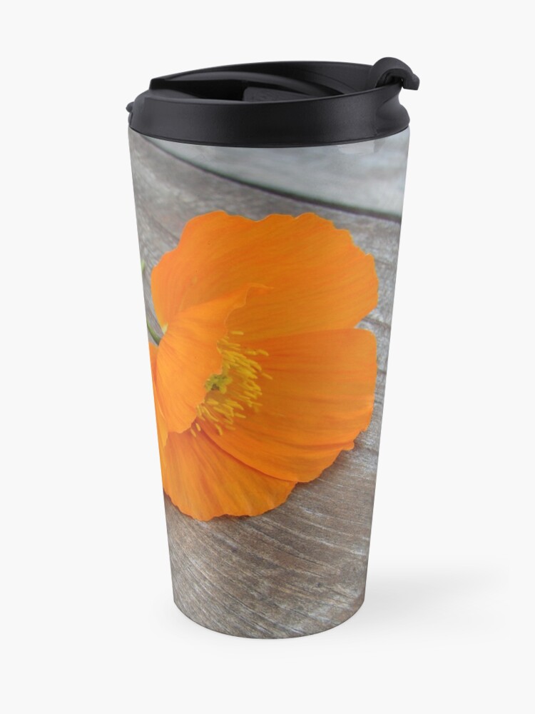 Alternate view of Orange flowers on a wooden table Travel Mug