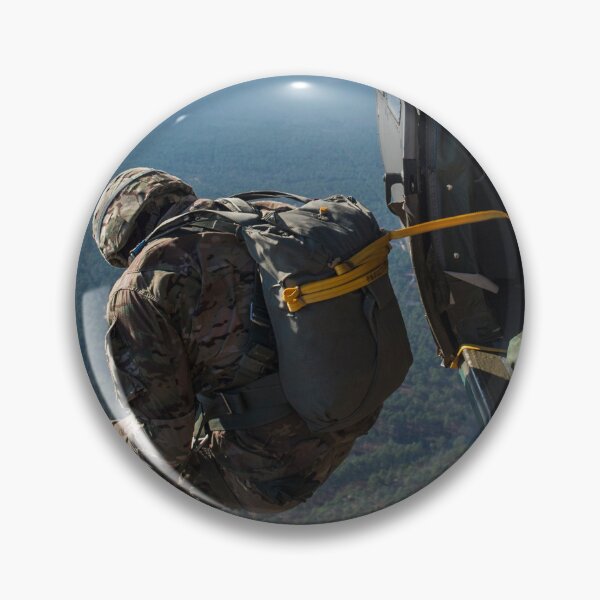 Item preview, STK109868M-A U.S. Army Soldier jumps out of a UH-60 Black Hawk. designed and sold by StocktrekImages.
