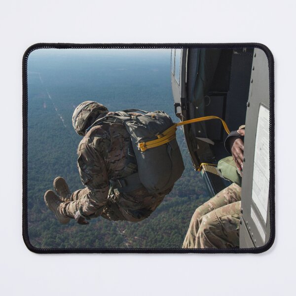 Item preview, STK109868M-A U.S. Army Soldier jumps out of a UH-60 Black Hawk. designed and sold by StocktrekImages.