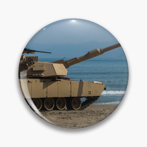 Item preview, STK109839M-U.S. Army Soldier guides an M1A1 Abrams Main Battle Tank on the beach. designed and sold by StocktrekImages.