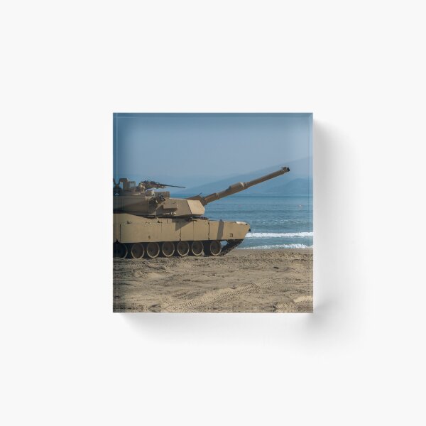 Item preview, STK109839M-U.S. Army Soldier guides an M1A1 Abrams Main Battle Tank on the beach. designed and sold by StocktrekImages.