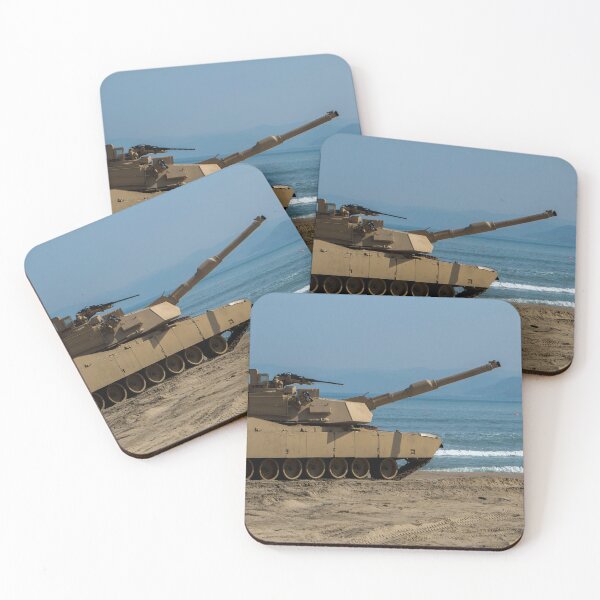 Item preview, STK109839M-U.S. Army Soldier guides an M1A1 Abrams Main Battle Tank on the beach. designed and sold by StocktrekImages.