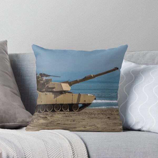 Item preview, STK109839M-U.S. Army Soldier guides an M1A1 Abrams Main Battle Tank on the beach. designed and sold by StocktrekImages.