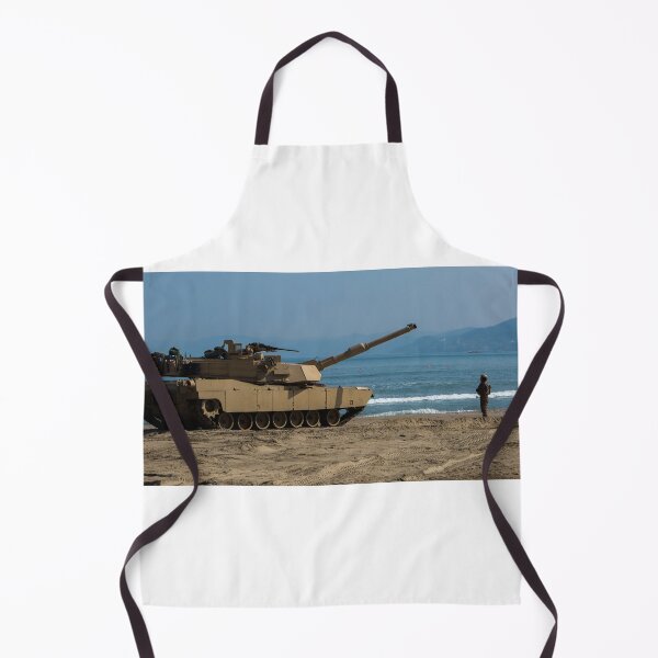 Item preview, STK109839M-U.S. Army Soldier guides an M1A1 Abrams Main Battle Tank on the beach. designed and sold by StocktrekImages.
