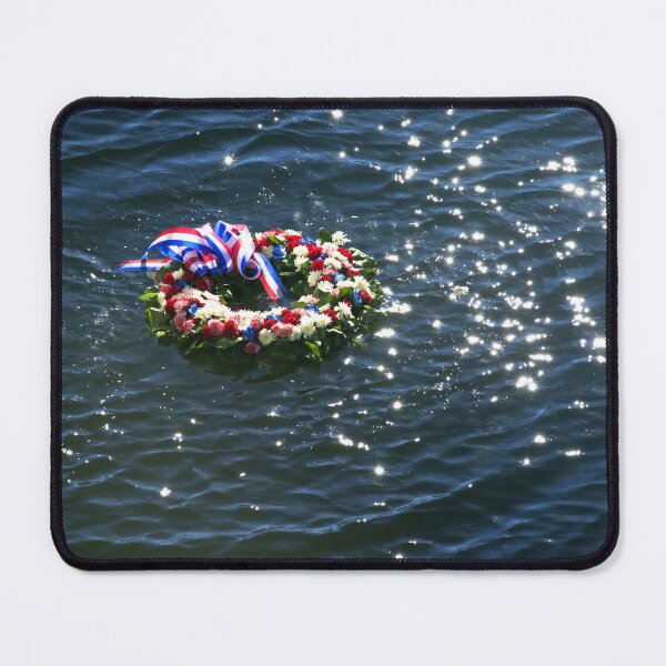Item preview, STK109646M-A floral wreath in the water to memorialize the lives lost during Pearl Harbor. designed and sold by StocktrekImages.